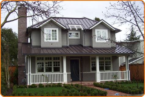 grey house brown metal roof|beige house with brown roof.